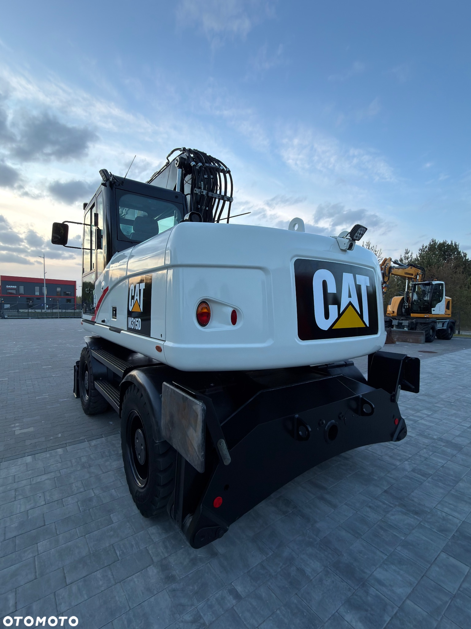 Caterpillar M315D rototilt7